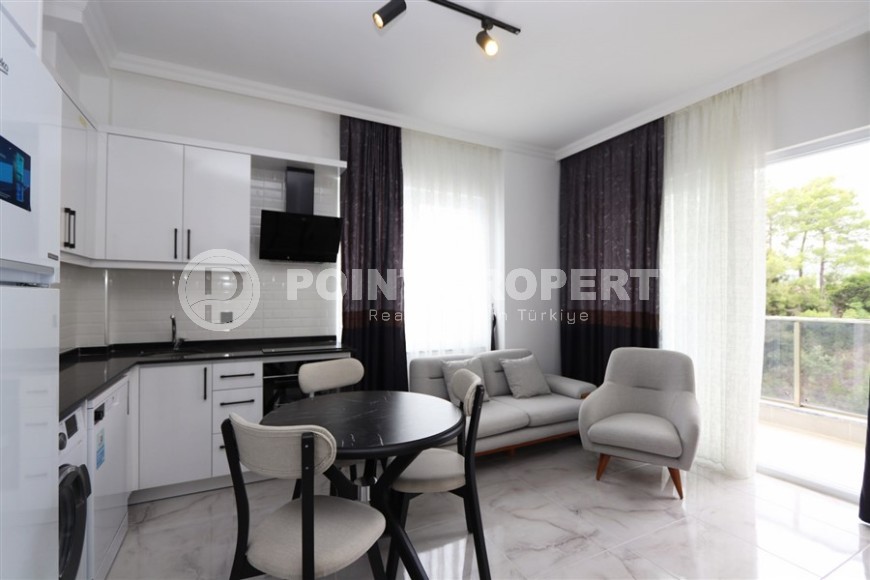 Compact 1+1 apartment 1200 meters from the sea, in a picturesque area of Alanya - Avsallar-id-8078-photo-1