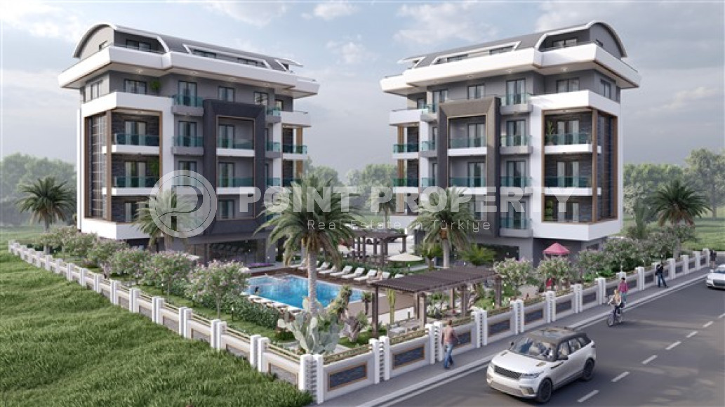 Two bedroom apartment, 75m², in a residence with a swimming pool under construction in Oba, Alanya-id-1636-photo-1