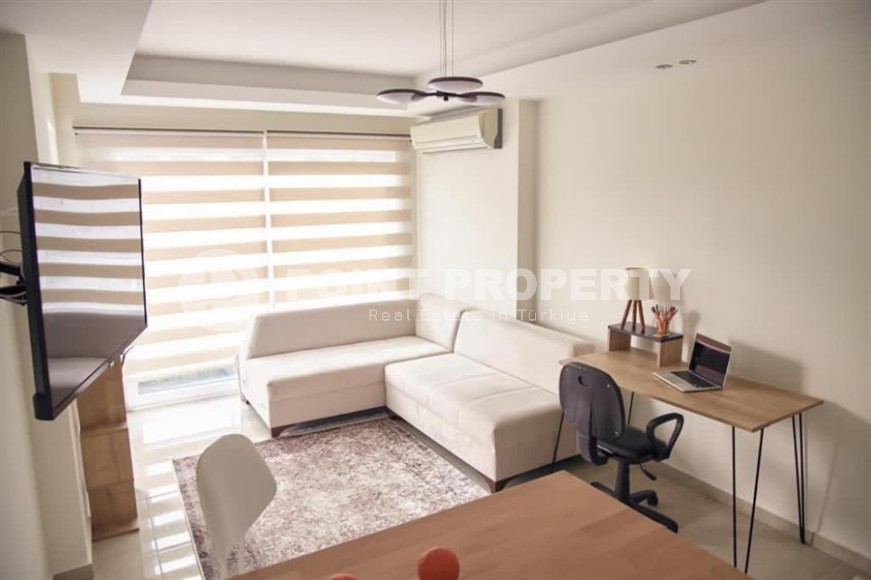 Modern 1+1 apartment 500 meters from the sea, in the center of Mahmutlar-id-8121-photo-1