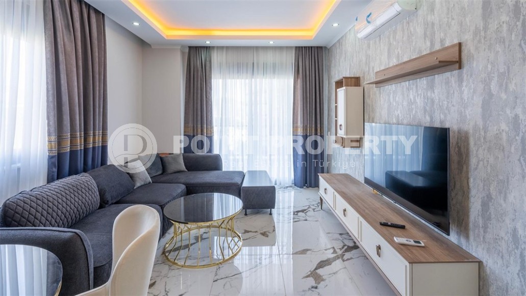 New apartment with modern design 750 meters from the sea, in the center of Mahmutlar-id-8125-photo-1