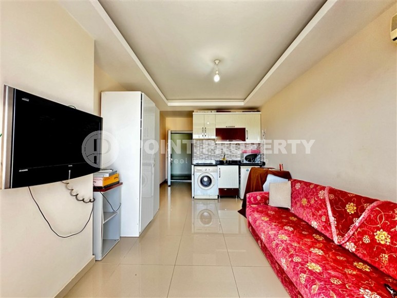 Compact studio with a total area of 30 m2, on the 10th floor in a residential complex built in 2014-id-8136-photo-1