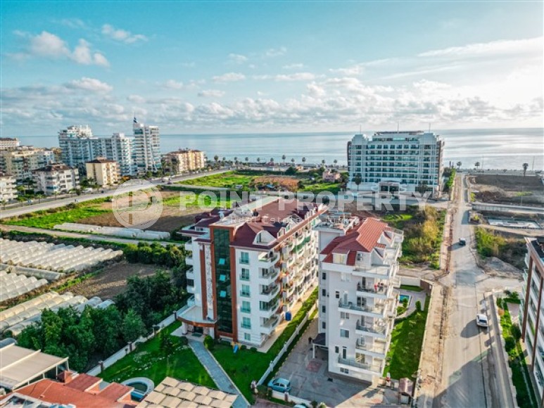 Large 1+1 apartment on the second coastline in Kestel-id-8311-photo-1