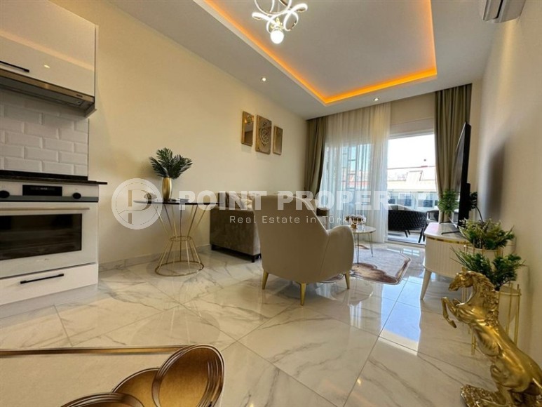 1+1 apartment with side sea view in Kestel area-id-8387-photo-1