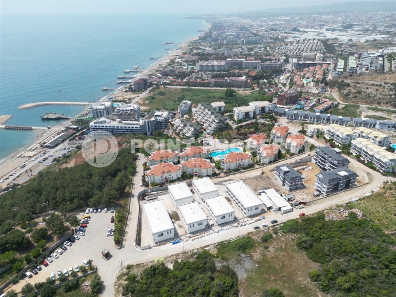 Exclusive project of townhouses 300 meters from the sea in Konakli area-id-8412-photo-1