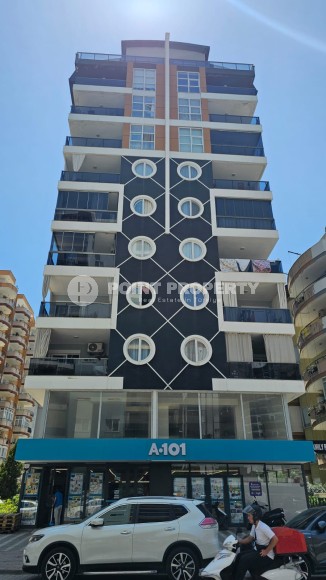 Two 1+1 apartments on different floors in a new building in Mahmutlar district-id-8435-photo-1