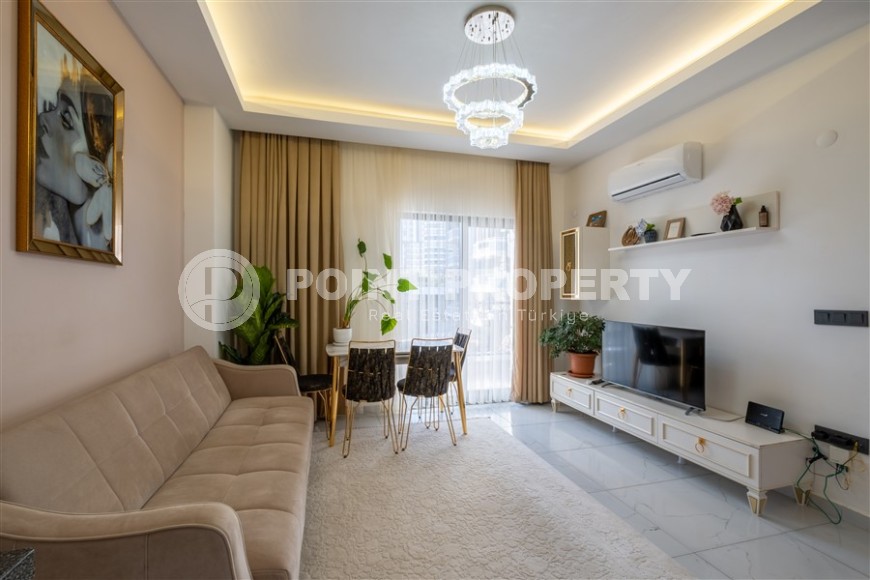 Apartment 1+1 with furniture at a good price in Mahmutlar-id-8450-photo-1