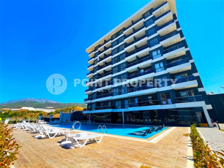 Inexpensive apartment with fine finishing two kilometers from the sea, in a quiet area of Alanya - Demirtas-id-8122-photo-1