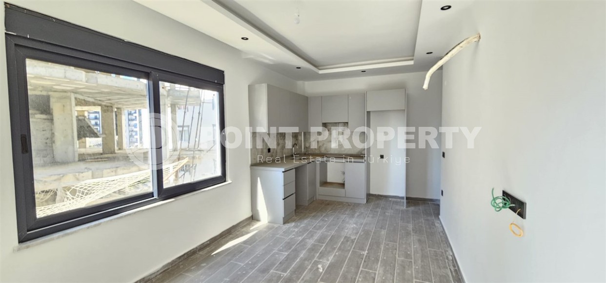 Новая квартира 50 м² по хорошей цене в Махмутларе-id-8596-photo-1