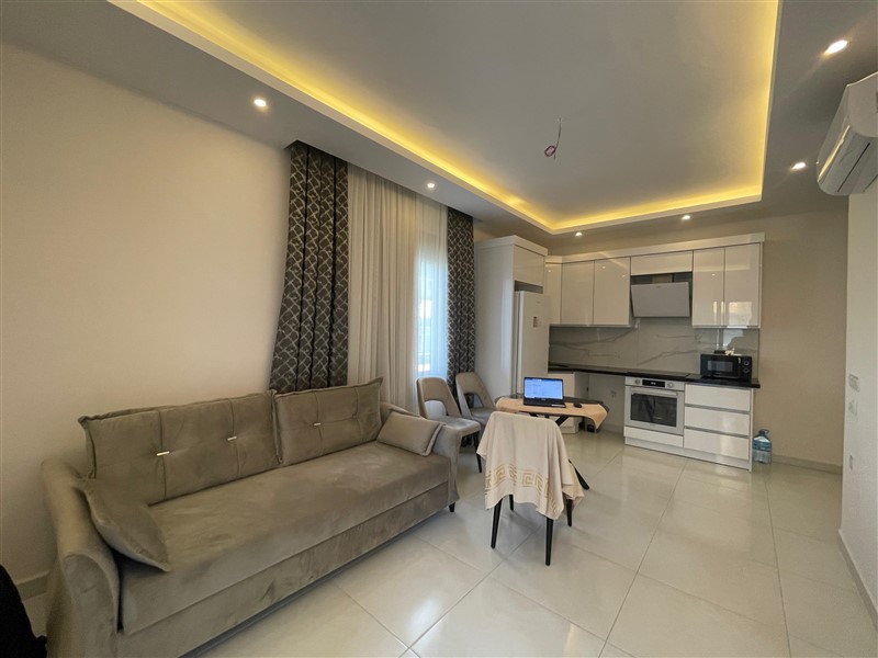 Современная квартира 55 м² в популярном комплексе Махмутлара-id-8625-photo-1