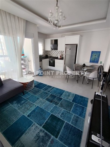 Modern apartment 55 m² with furniture in Mahmutlar-id-8766-photo-1