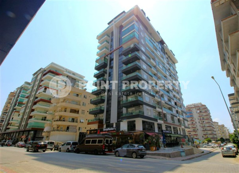 Furnished two bedroom apartment, 115m², on the main street of Mahmutlar, Alanya-id-1725-photo-1