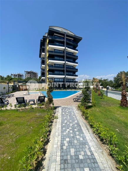 New one-bedroom apartment, 70m², in a complex with good infrastructure in Avsallar, Alanya-id-1758-photo-1