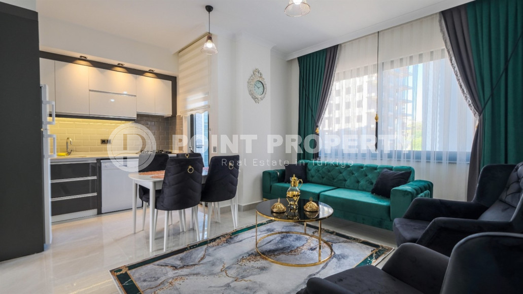 One-bedroom apartment in one of the developed areas of Alanya in Mahmutlar. Layout 1+1, 350 meters from the sea.-id-1112-photo-1