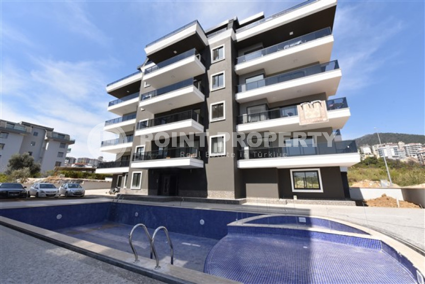 Three bedroom apartment, 165m², in a new urban building in Oba, Alanya-id-1799-photo-1