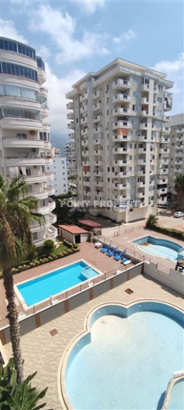 Three-room apartment, 115m², in a residence with a swimming pool in Mahmutlar, Alanya, 100m from the sea-id-1804-photo-1