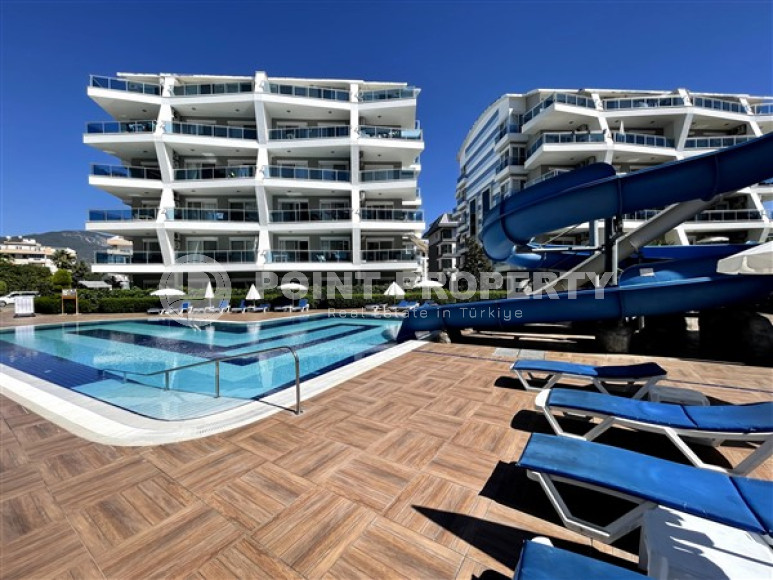 One-bedroom apartment, 55m², in the Oba area, Alanya, in a complex with hotel infrastructure-id-1824-photo-1