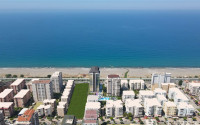 Инвестиционная элитная недвижимость на берегу Средиземного моря в Махмутларе, Алания, 73-175м²-id-1862-фото-23