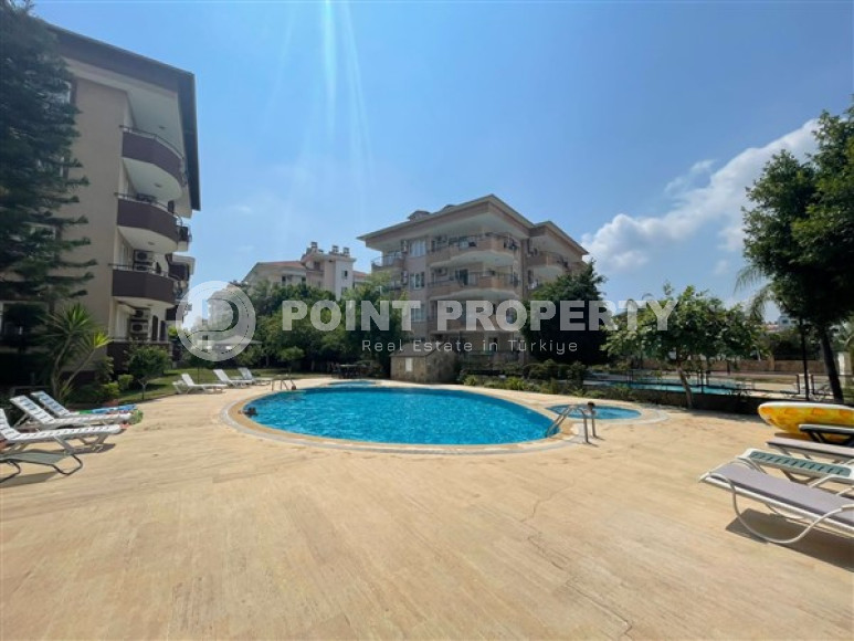 Resale property in the Oba area: three-room apartment, 110 m², in a residence with a swimming pool.-id-1893-photo-1