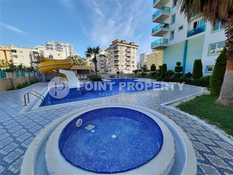 New two bedroom apartment, 120m², with sea and mountain views in Mahmutlar, Alanya-id-1901-photo-1