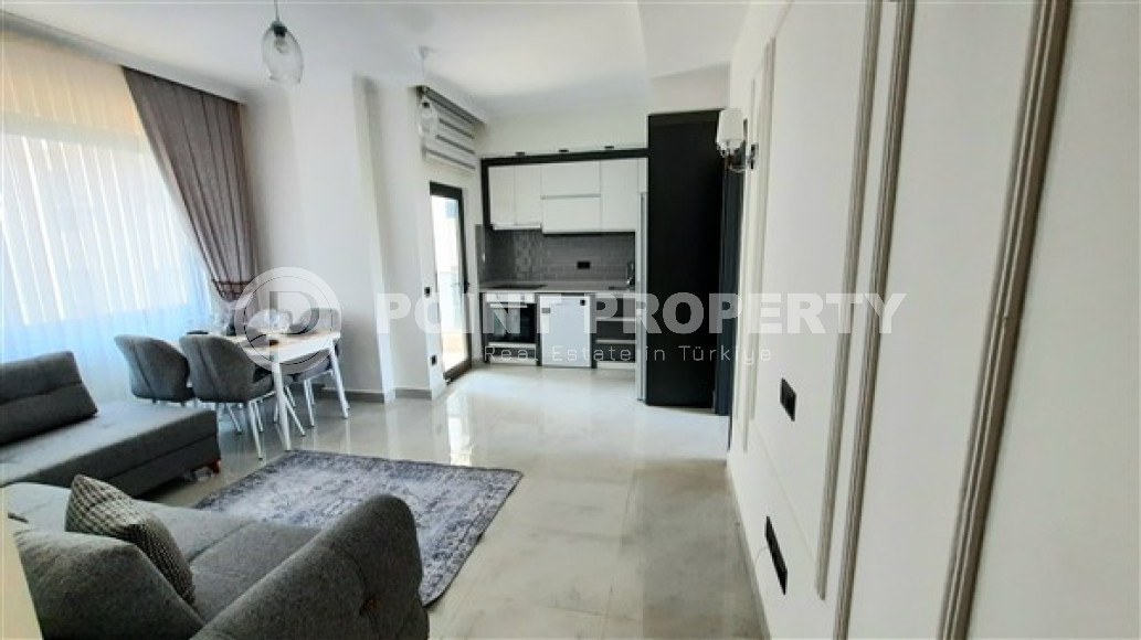 One bedroom apartment, 55m², in a new complex with infrastructure in Mahmutlar, Alanya-id-1906-photo-1