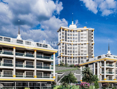 Инвестиционный грандиозный проект премиум класса с квартирами планировок от 1+1 до 5+1 в районе Махмутлар.-id-1140-фото-1