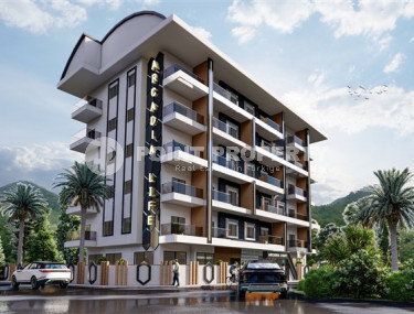 Новый инвестиционный проект с апартаментами 1+1 и 2+1 в Махмутларе с развитой инфраструктурой в 650 метрах от морского побережья.-id-1160-фото-1