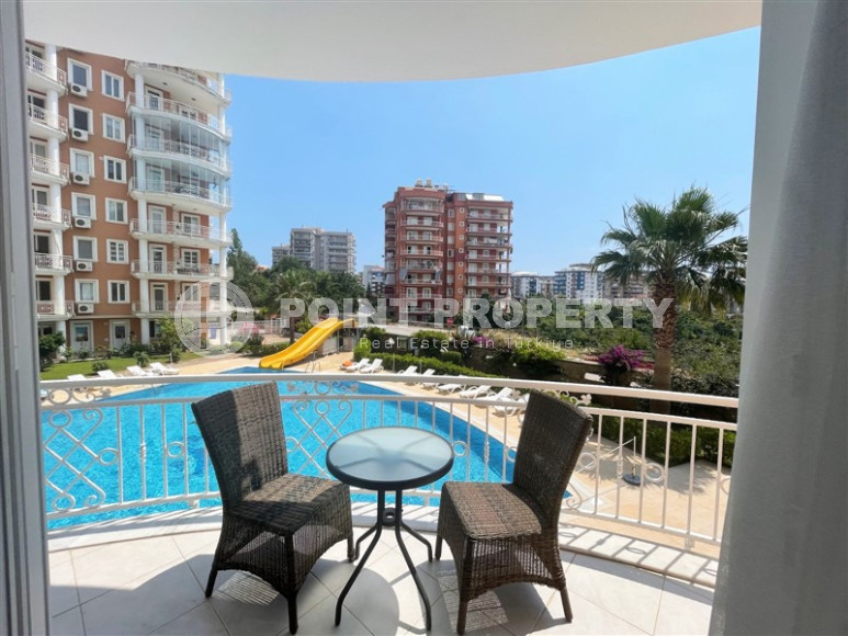 Furnished three-room apartment with mountain views in Alanya Tosmur-id-1189-photo-1