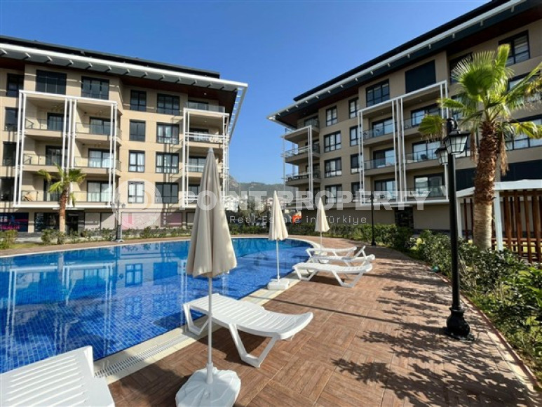 One-bedroom apartment with an elegant interior, 52m², in a new residence in the Alanya area - Upper Oba-id-2285-photo-1