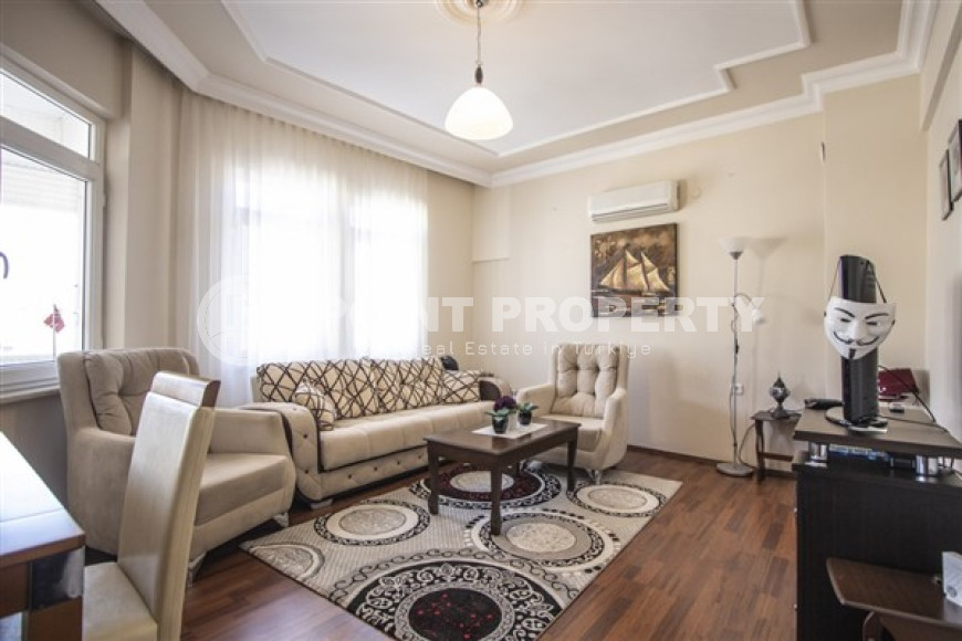 Three-room apartment, 110m², with separate kitchen, close to the sea in the center of Alanya at a great price-id-2313-photo-1