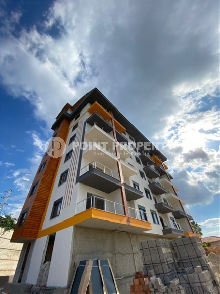 Апартаменты с двумя спальнями, 95 м² в новом комплексе с бассейном в районе Демирташ, Аланья-id-2341-фото-1