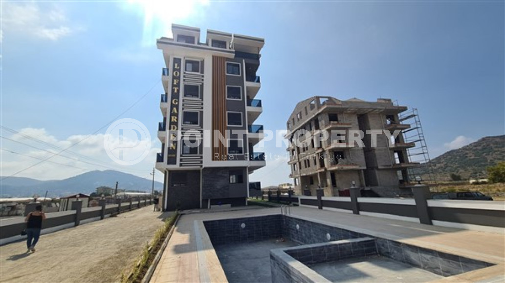 Three bedroom penthouse, 120m², in a residence in the final stage of construction in the Gazipasa area-id-2380-photo-1