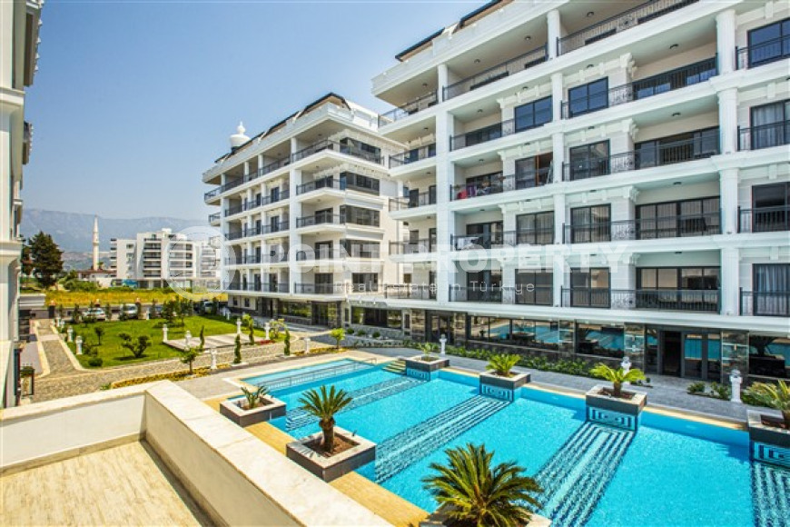 Two bedroom apartment, 120m², in a luxury complex 100m from the sea in Kargicak, Alanya-id-2411-photo-1