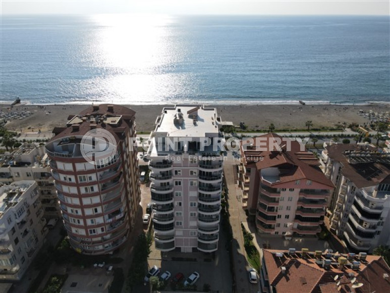 Furnished view apartment 2+1, 110m², on the first coastline in Mahmutlar, Alanya-id-2414-photo-1