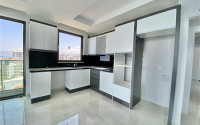 Новая трехкомнатная квартира, 80м², с видом на море, в элитном комплексе Махмутлара, Алания-id-2416-фото-3
