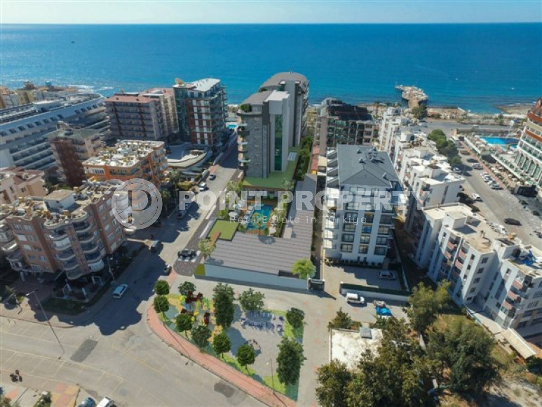 New three-room apartment, 95m², in an elite complex on the seafront in Oba, Alanya-id-2465-photo-1