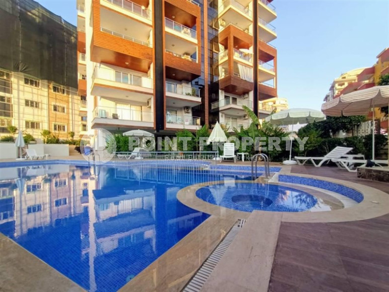 Excellent two-room apartment with 1+1 layout, 65 m2 in Alanya in Mahmutlar. Only 350 m to the sea.-id-1215-photo-1