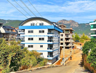 One-bedroom apartment, 70m² in a new complex with a swimming pool 1200m from the sea in Upper Oba, Alanya-id-2532-photo-1