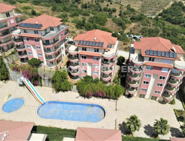 Furnished three-room apartment in Mahmutlar area with private garden, 130 m2-id-1219-photo-1