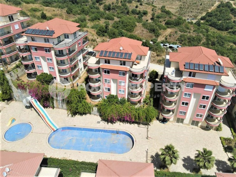 Furnished three-room apartment in Mahmutlar area with private garden, 130 m2-id-1219-photo-1