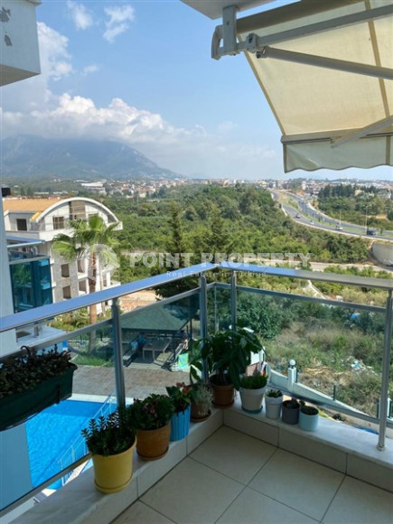Four-room apartment with mountain views 140 m2, in the Oba area, Alanya, furnished, 2 kilometers from the sea-id-2689-photo-1