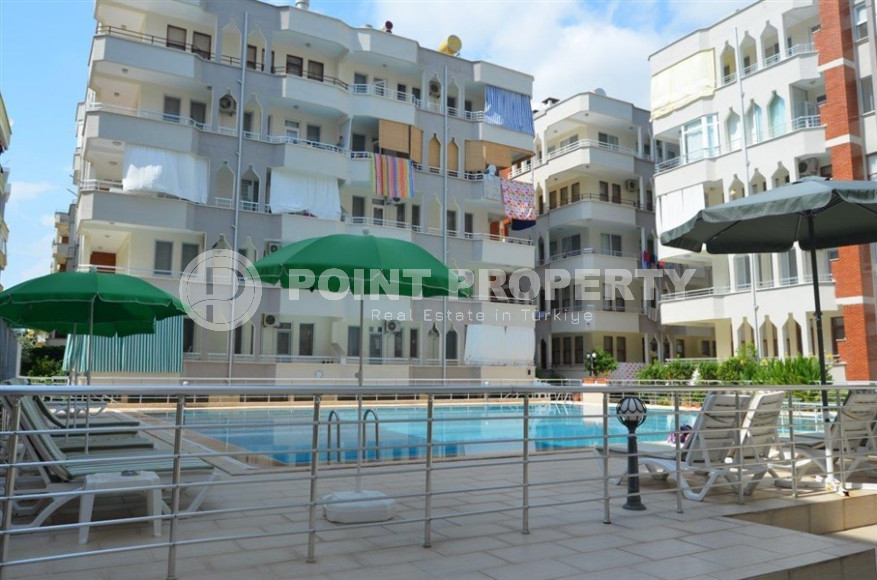Furnished three-room apartment in Mahmutlar area, 100 m2. 400 meters to the sea.-id-1239-photo-1