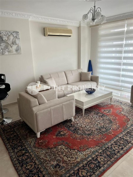 Three-room apartment, 110m², 50m from Keykubat beach in an urban house in the center of Alanya-id-2751-photo-1