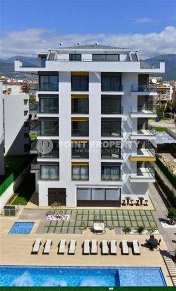 Elegant and small two-room apartment in the lower Oba area, Alanya, 150 meters from the sea, in a five-story complex with 24-hour security-id-2784-photo-1