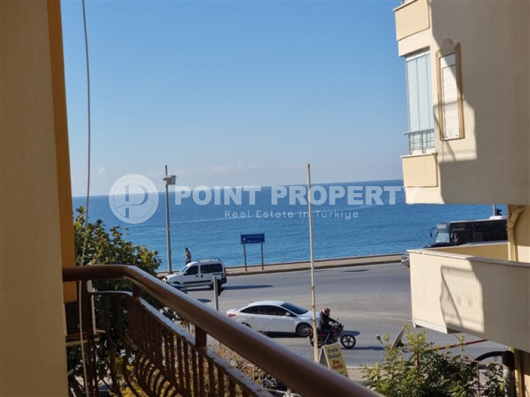 Three-room apartment 2+1 on the first coastline in the residential area of Alanya Tosmur-id-2817-photo-1