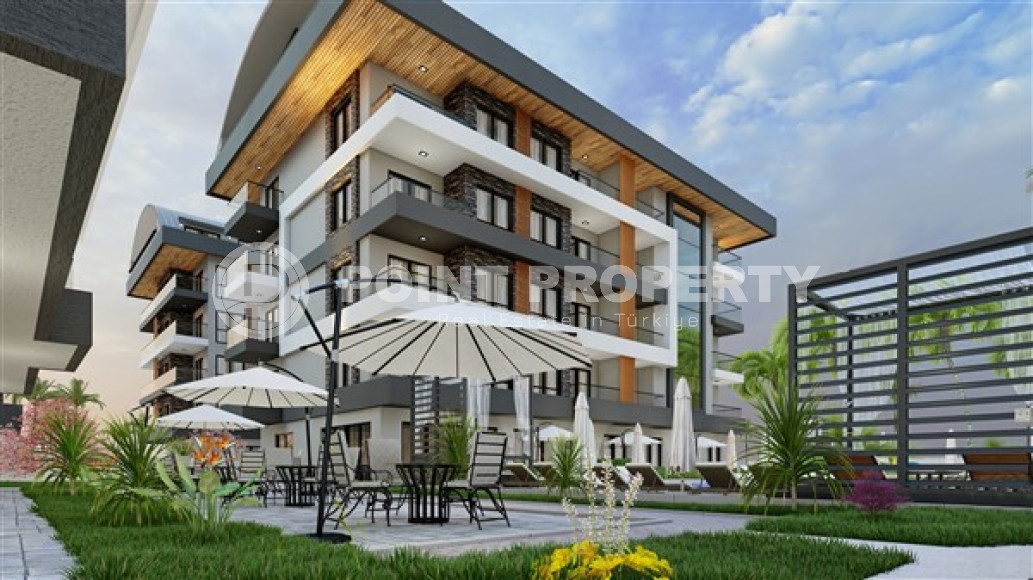 Недорогая квартира небольшой площадью 45 м2 в строящемся комплексе (июнь 2023 года) в районе Оба, Аланья-id-2890-фото-1