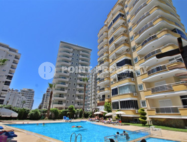 Cozy three-room apartment, 130m², in a complex with infrastructure, near the sea in Mahmutlar, Alanya-id-1261-photo-1