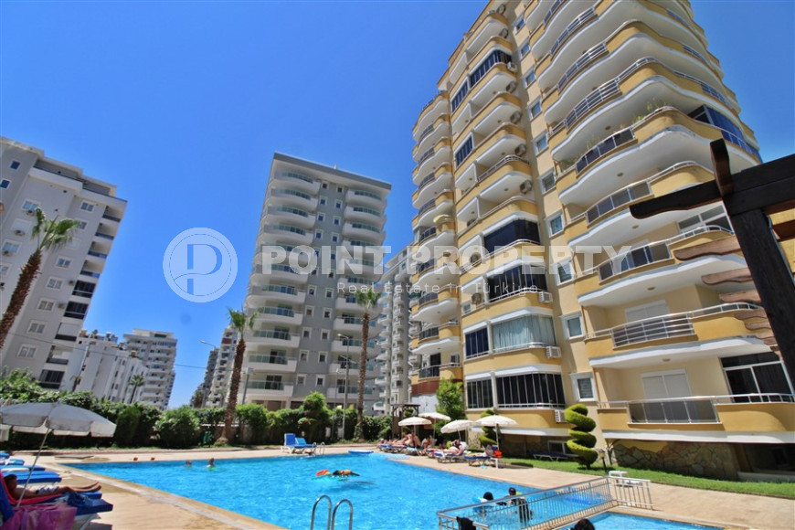 Cozy three-room apartment, 130m², in a complex with infrastructure, near the sea in Mahmutlar, Alanya-id-1261-photo-1