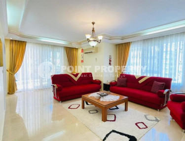 Large furnished three-room apartment, 130m², in a cozy complex on the first line in Mahmutlar-id-1262-photo-1