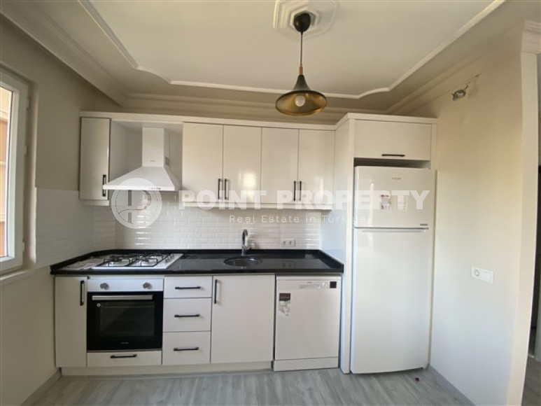 Cozy apartment of 100 m2 150 meters from the sea, Tosmur, Alanya is sold unfurnished-id-3035-photo-1