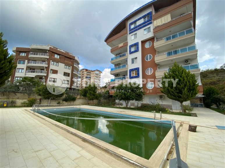 Classic 1+1 apartment at a low price, Avsallar, Alanya, in the complex 2022-id-3037-photo-1